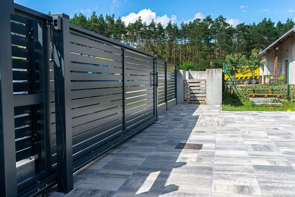 Dual swing driveway gate installed by Al's Automatic Gate