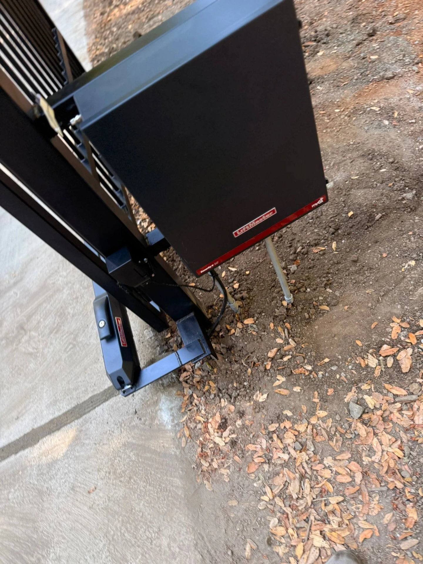 LiftMaster sliding gate operator installed on an automatic driveway gate in Marin County