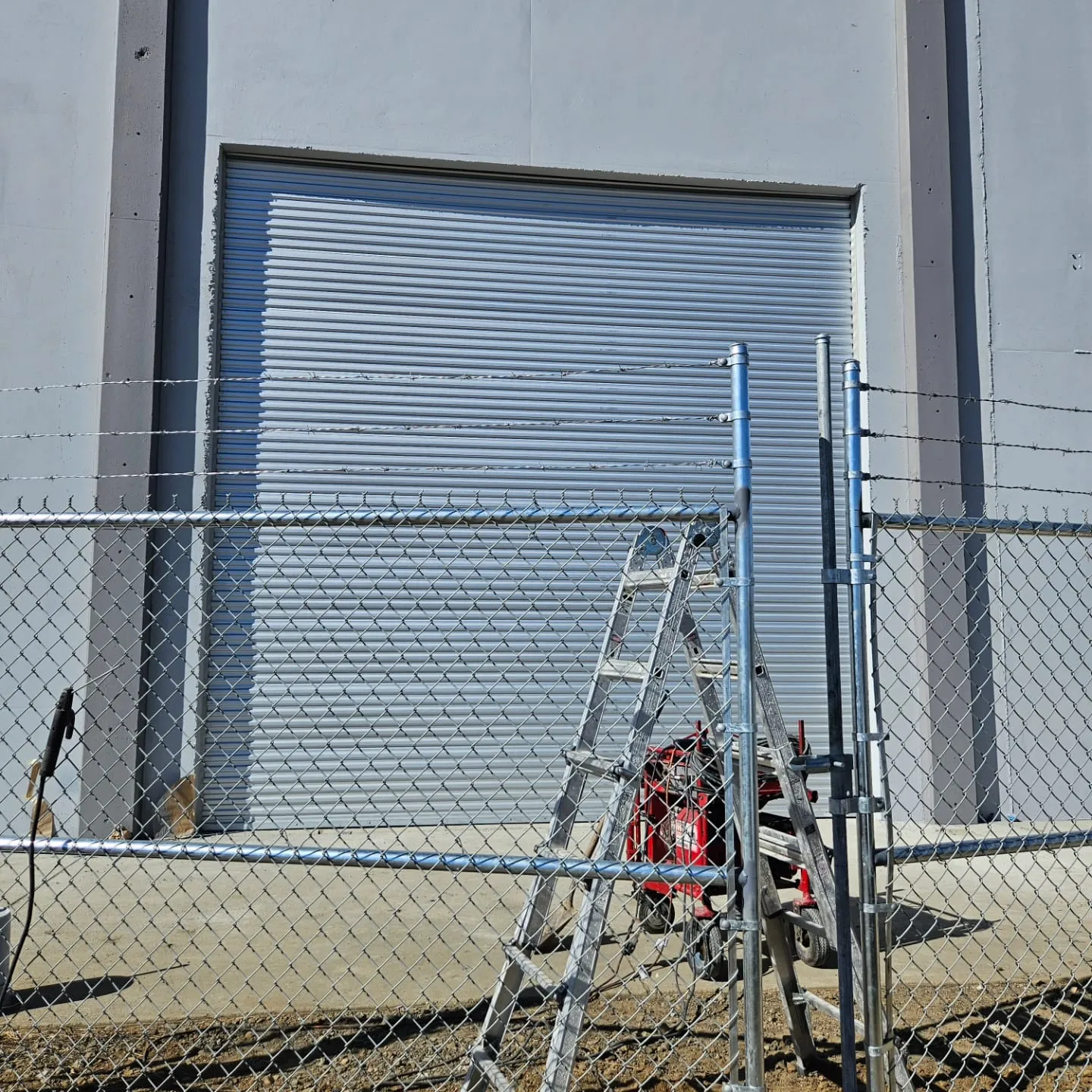 Chain link security fence installation at a Bay Area commercial property