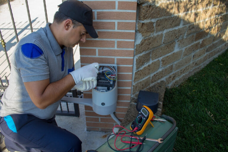 Al's Automatic Gate technician wiring a swing gate operator control board in Marin County